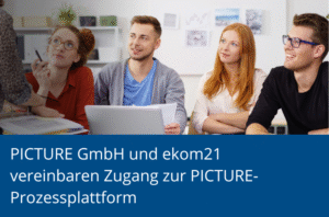 Gruppe von Personen in Workshop-Situation am Tisch, darauf der Text "PICTURE GmbH und ekom21 vereinbaren Zugang zur PICTURE-Prozessplattform